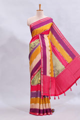 Multi color kalamkari style printed saree with contrast zari border and motifs blouse