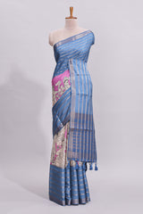 Beige trational kalamkari style printed saree with contrast border and printed blouse