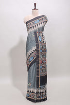 Grey ikkat style floral motifs tussar saree with contrast border and crane bird motif blouse