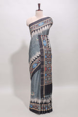 Grey ikkat style floral motifs tussar saree with contrast border and crane bird motif blouse