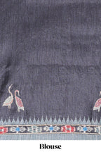 Grey ikkat style floral motifs tussar saree with contrast border and crane bird motif blouse