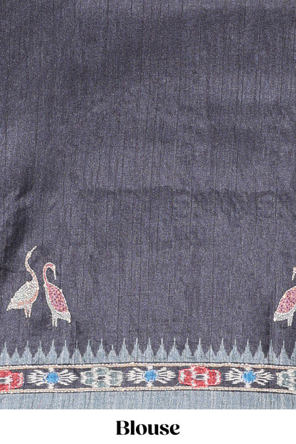 Grey ikkat style floral motifs tussar saree with contrast border and crane bird motif blouse