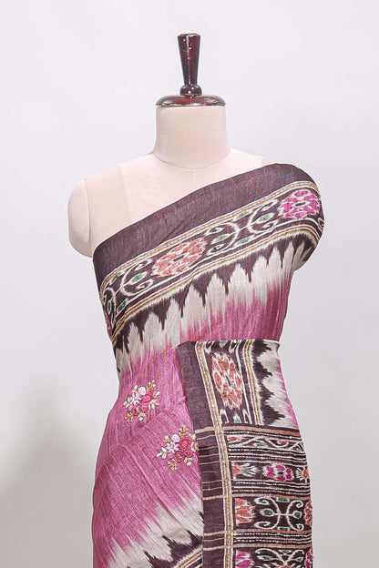 Pink ikkat style floral motifs tussar saree with contrast border and crane bird motif blouse