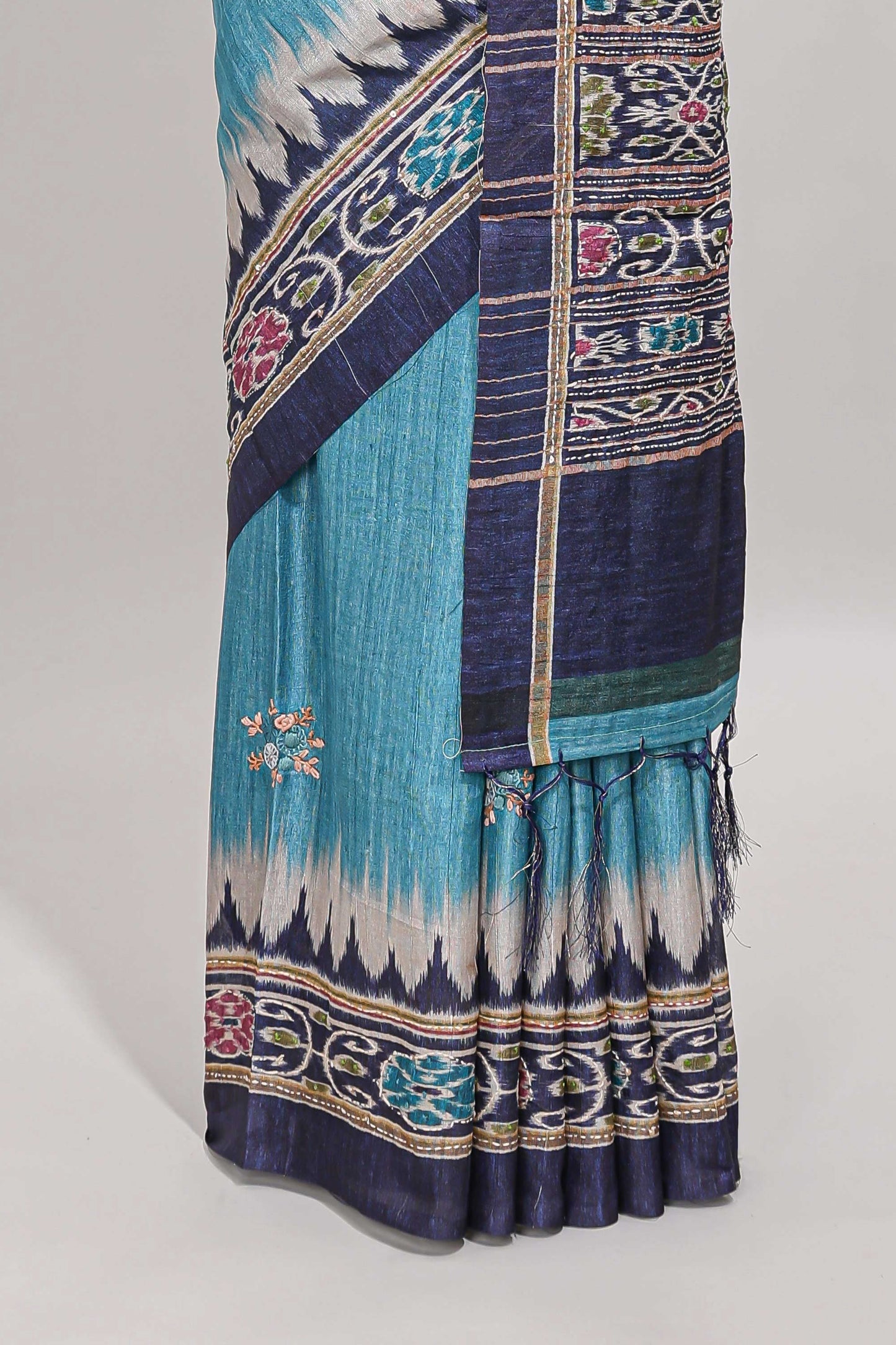 Blue ikkat style floral motifs tussar saree with contrast border and crane bird motif blouse