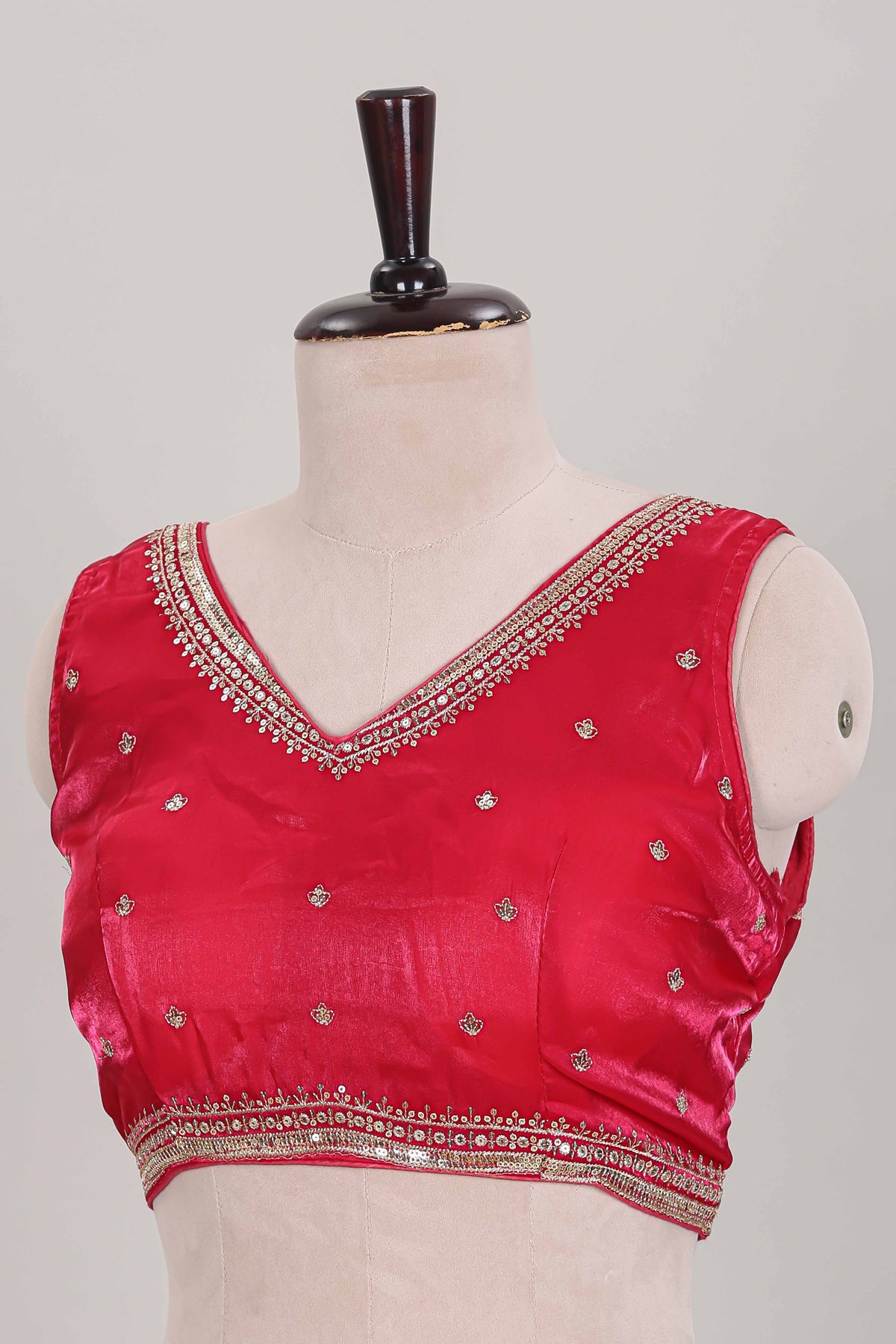 Rani pink embroidery work readymade designer blouse, sleeveless V neck with back tassels