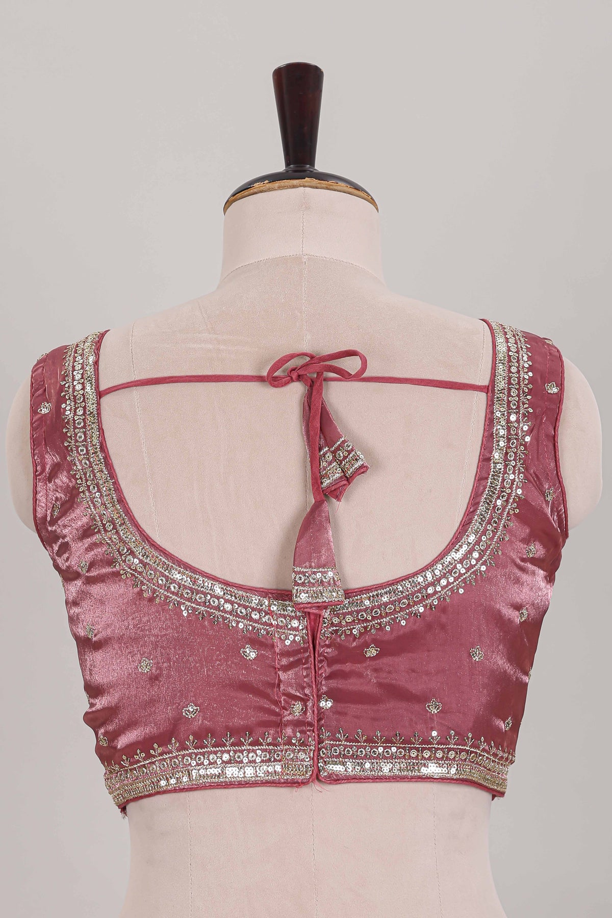 Peach embroidery work readymade designer blouse, sleeveless V neck with back tassels