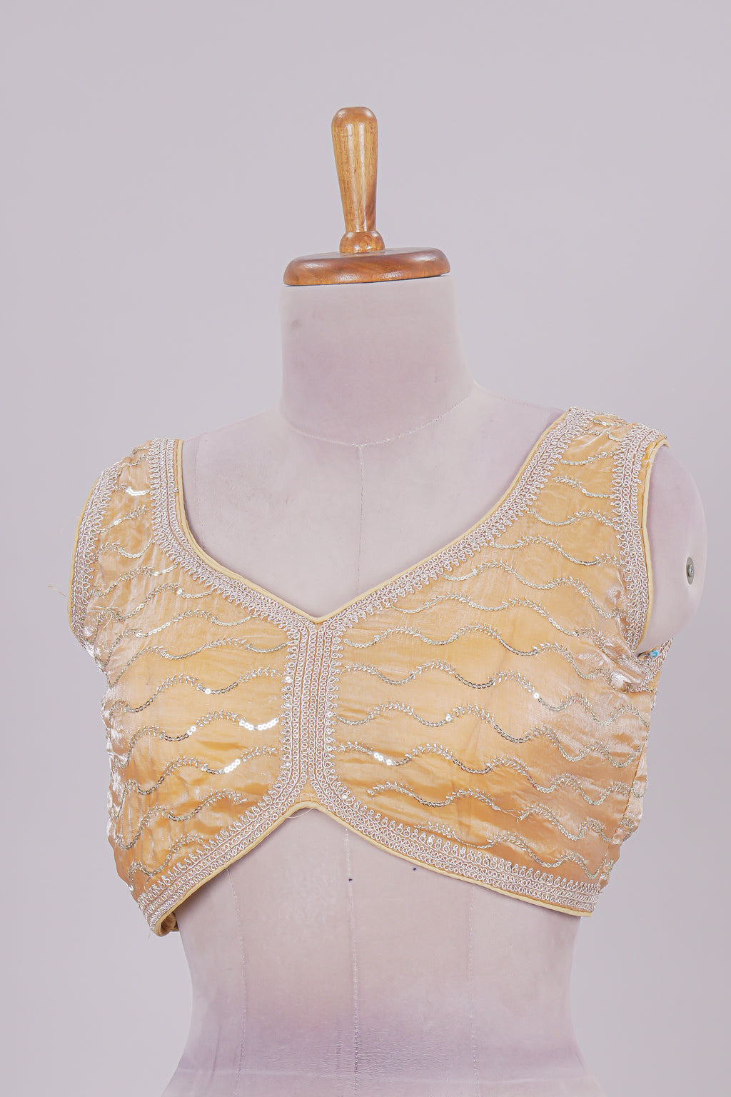 Yellow chamki embroidery work readymade designer blouse, sleeveless V neck with back tassels