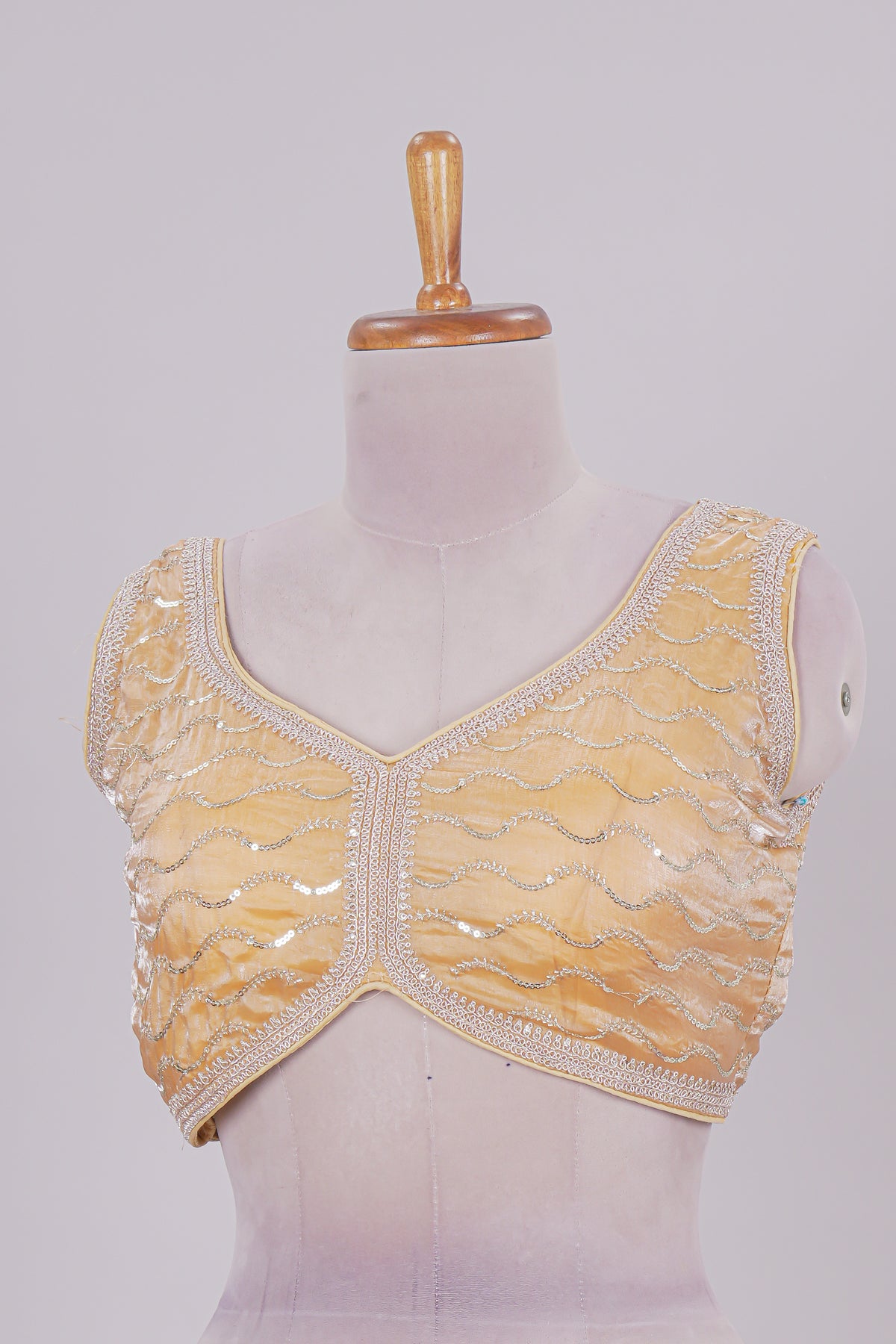 Yellow chamki embroidery work readymade designer blouse, sleeveless V neck with back tassels