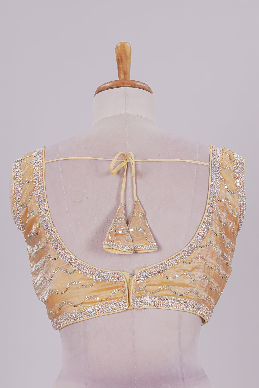 Yellow chamki embroidery work readymade designer blouse, sleeveless V neck with back tassels