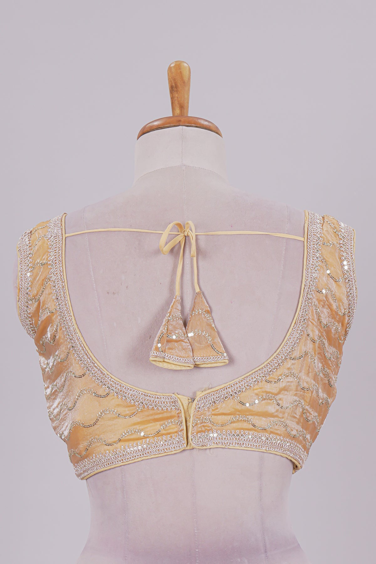 Yellow chamki embroidery work readymade designer blouse, sleeveless V neck with back tassels