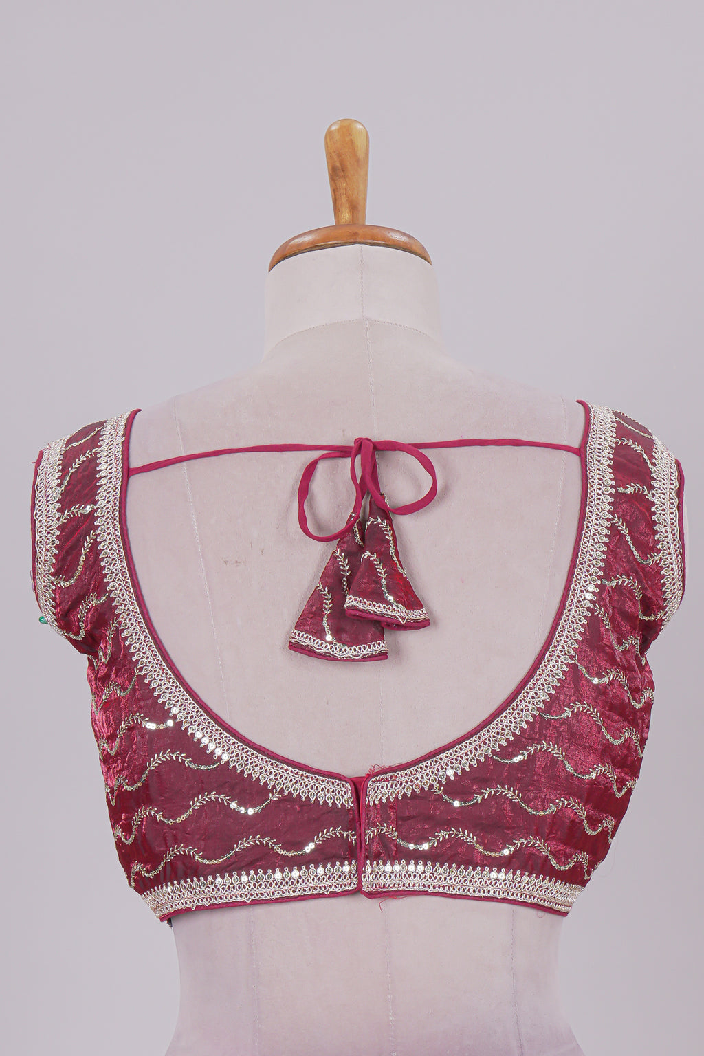 Maroon chamki embroidery work readymade designer blouse, sleeveless V neck with back tassels