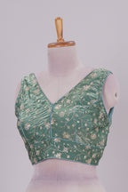 Green floral chamki embroidery work readymade designer blouse, sleeveless V neck with back tassels