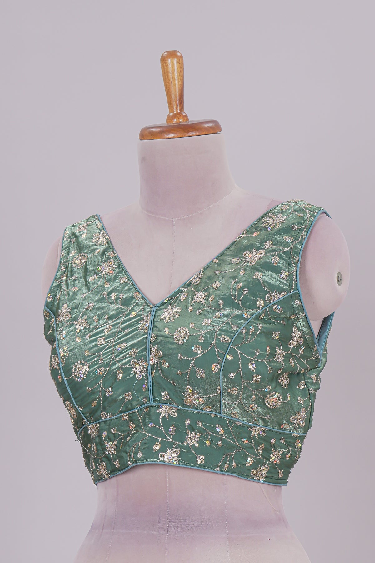 Green floral chamki embroidery work readymade designer blouse, sleeveless V neck with back tassels