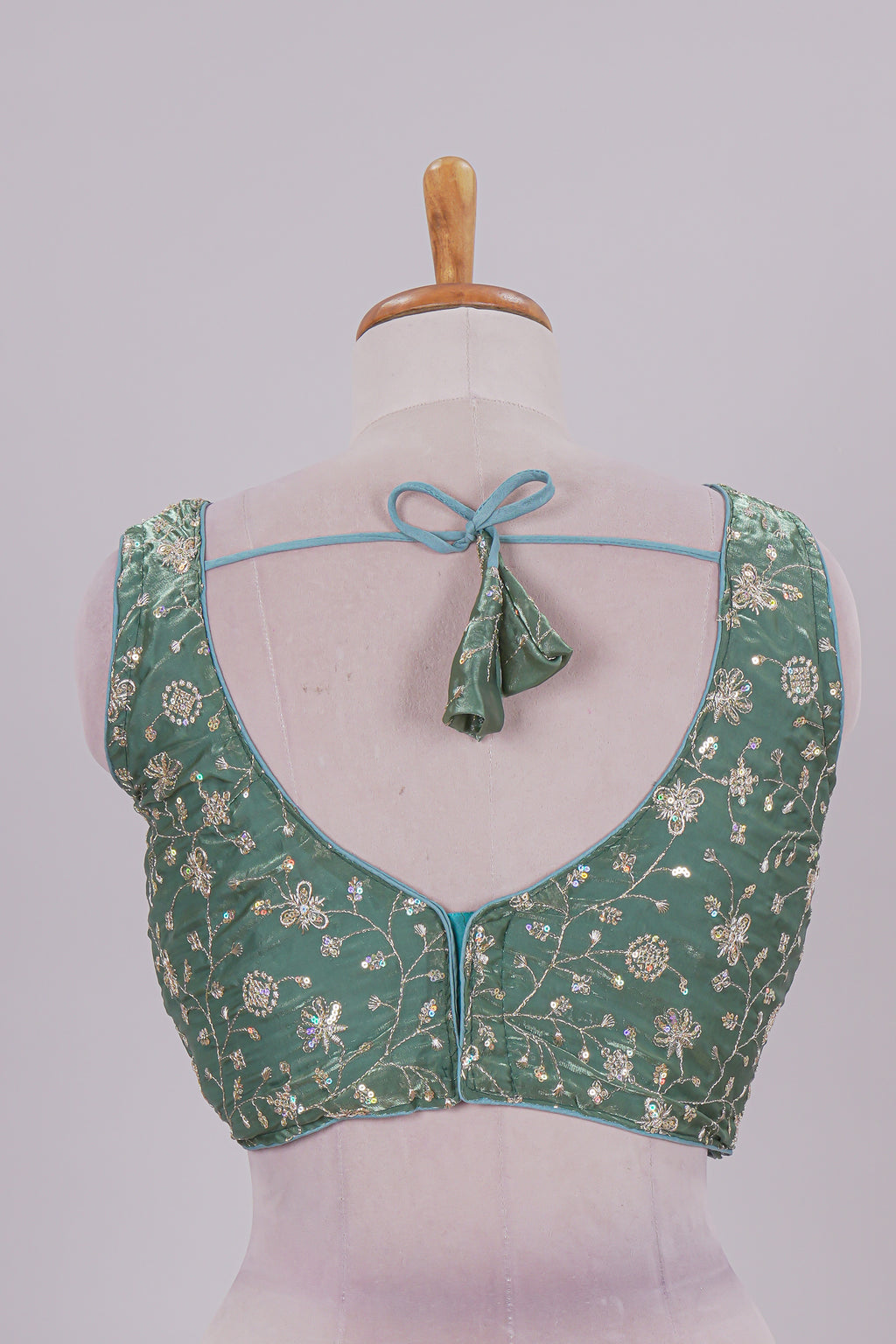 Green floral chamki embroidery work readymade designer blouse, sleeveless V neck with back tassels