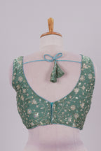 Green floral chamki embroidery work readymade designer blouse, sleeveless V neck with back tassels