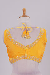 Golden yellow chamki embroidery work readymade designer blouse, sleeveless V neck with back tassels