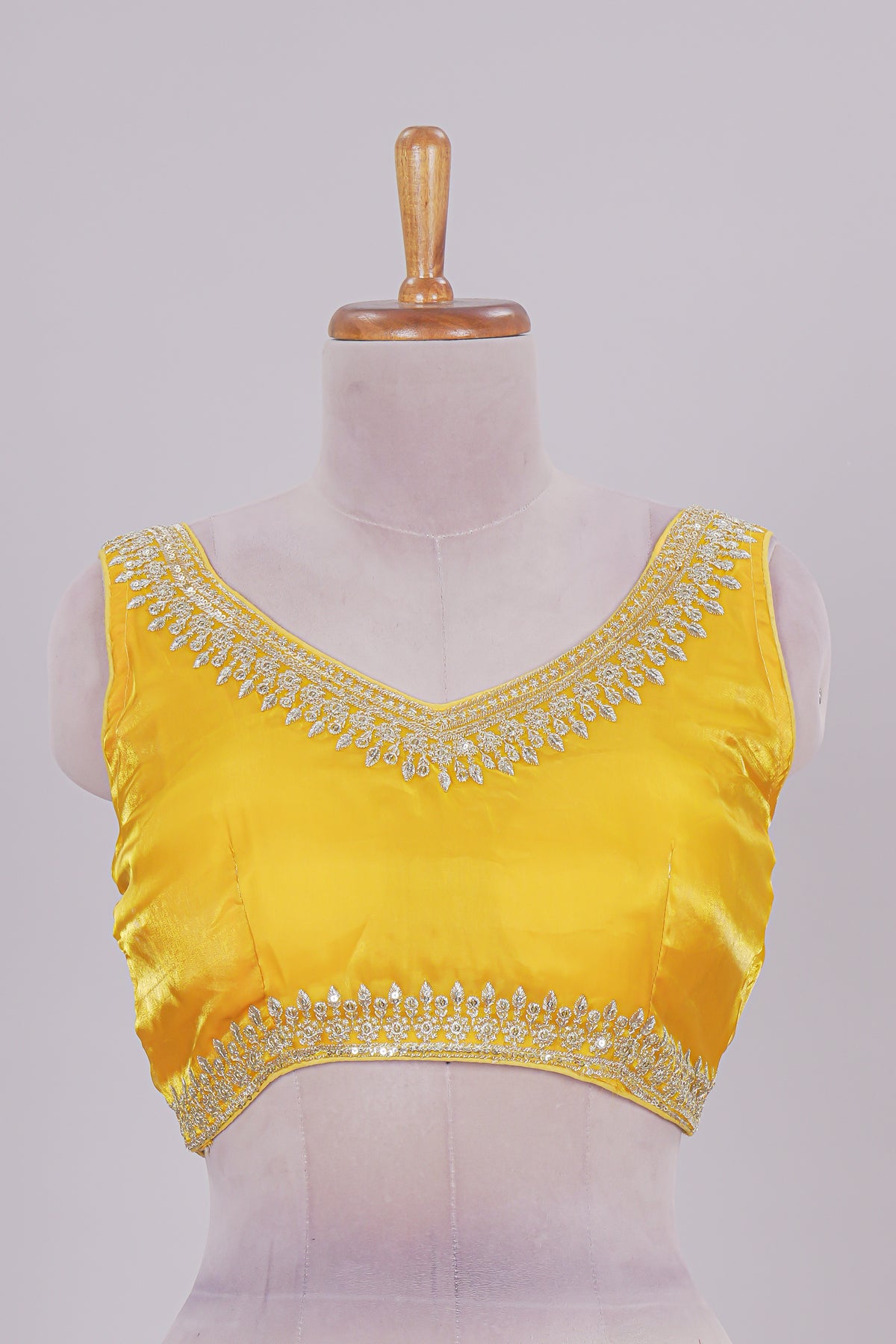 Yellow chamki embroidery work readymade designer blouse, sleeveless V neck with back tassels