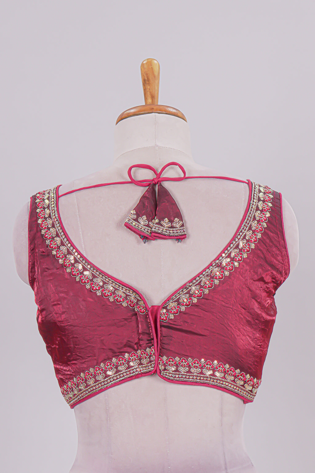 Maroon chamki embroidery work readymade designer blouse, sleeveless V neck with back tassels