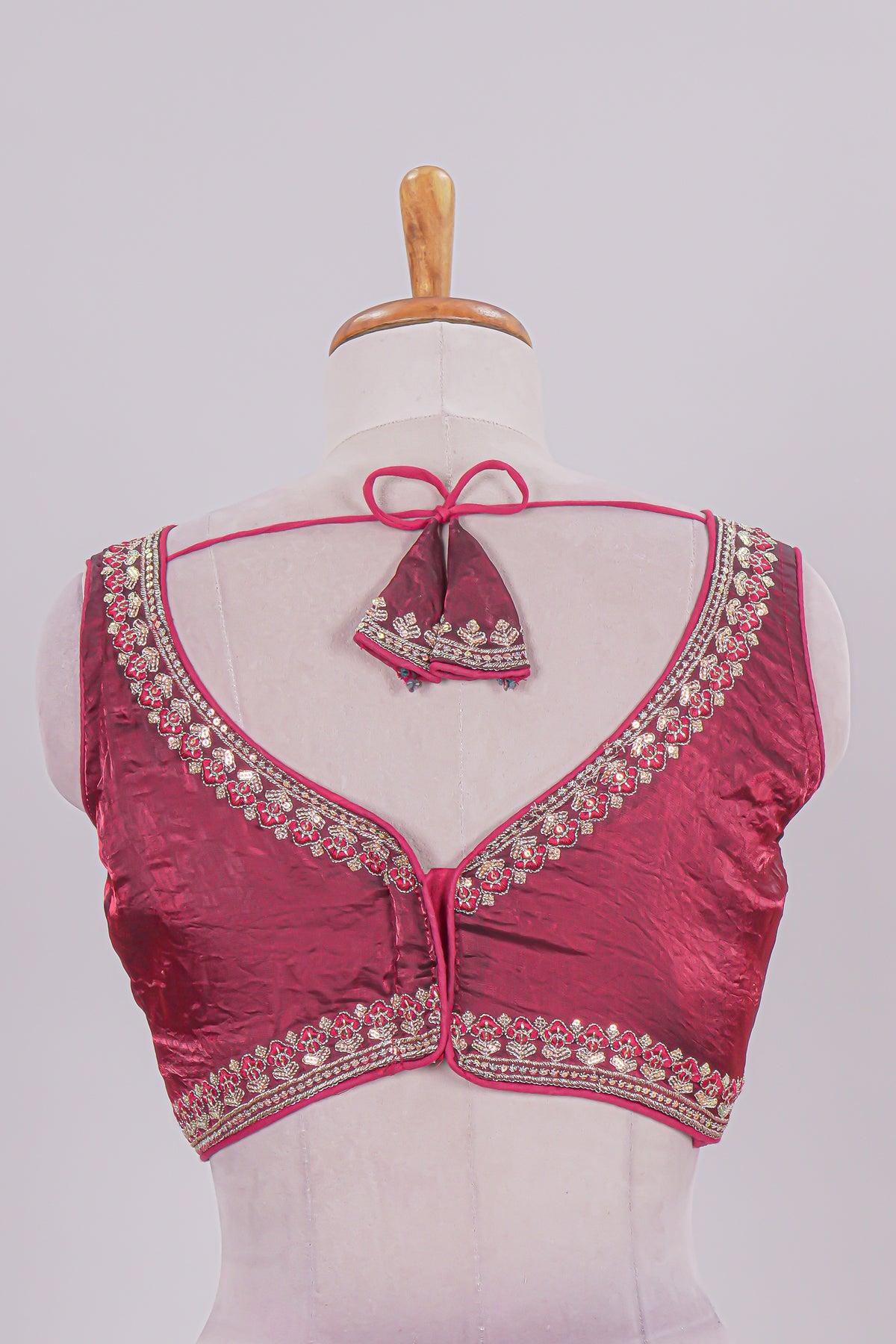 Maroon chamki embroidery work readymade designer blouse, sleeveless V neck with back tassels