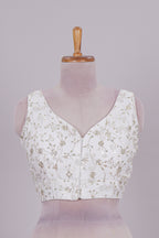 White chamki embroidery work readymade designer blouse, sleeveless V neck with back tassels