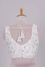 White chamki embroidery work readymade designer blouse, sleeveless V neck with back tassels