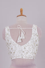 White chamki embroidery work readymade designer blouse, sleeveless V neck with back tassels