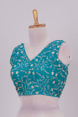 Viridian green floral chamki embroidery work readymade designer blouse, sleeveless V neck with back tassels