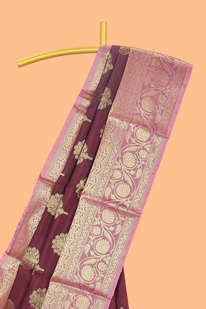 Maroon floral design zari butta raw silk saree with contrast zari border and pallu