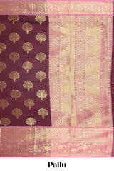 Maroon floral design zari butta raw silk saree with contrast zari border and pallu