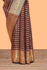 Brown zari buttas raw silk saree with self zari border and matching blouse