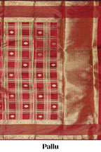 Red zari checks and buttas raw silk saree with self zari border and matching blouse