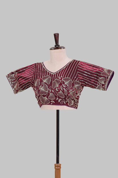 Maroon floral butta design embroidery work readymade designer blouse, sleeveless V neck with back tassels