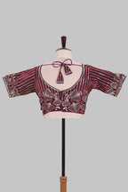 Maroon floral butta design embroidery work readymade designer blouse, sleeveless V neck with back tassels