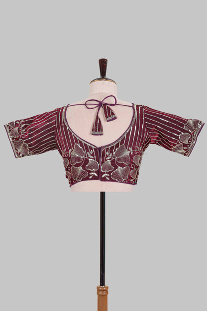 Maroon floral butta design embroidery work readymade designer blouse, sleeveless V neck with back tassels