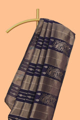 Borderless blue striped and peacock zari design raw silk saree with self zari pallu and matching blouse
