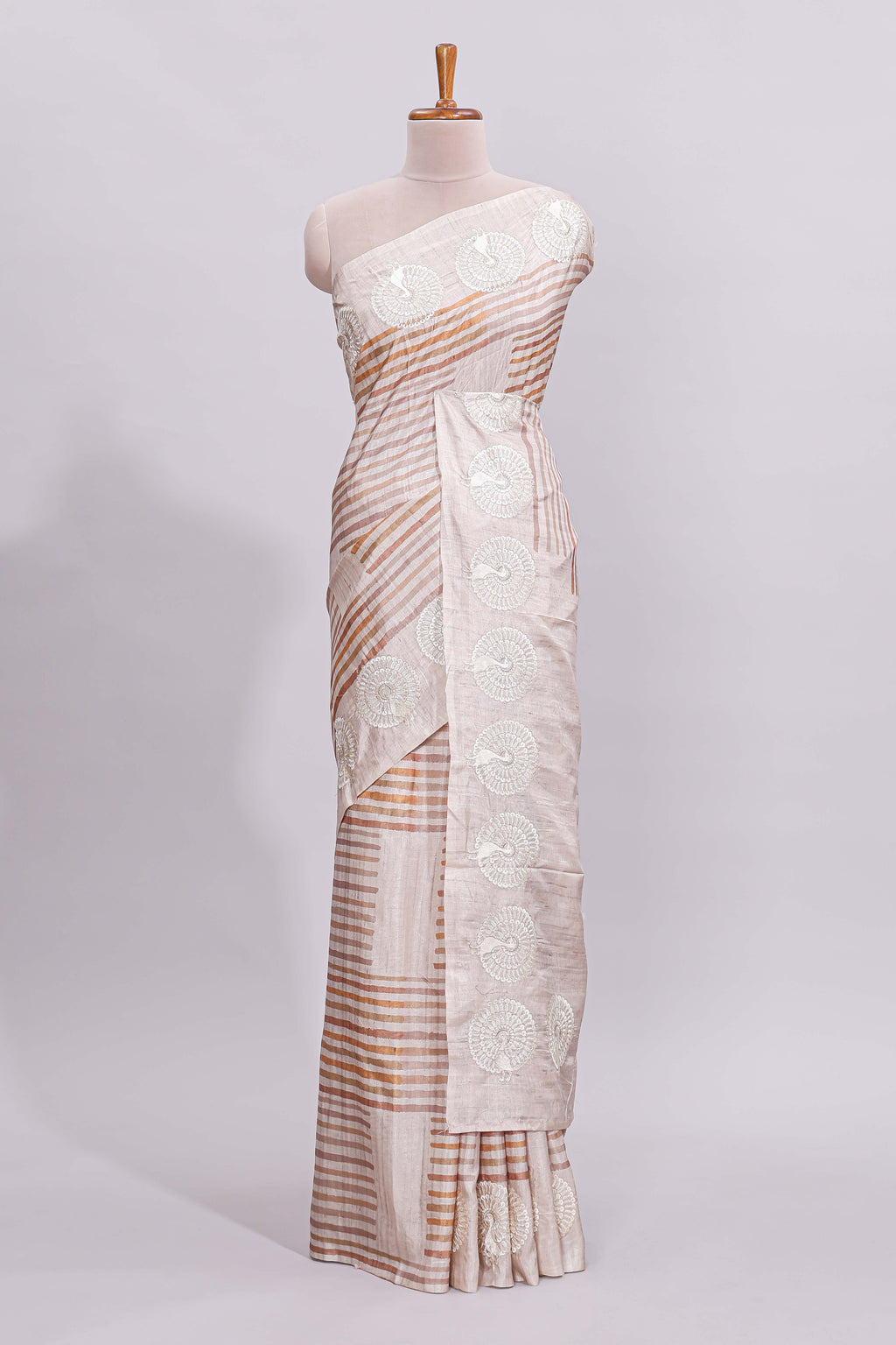 Beige striped design raw silk saree with self border and matching blouse