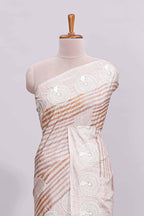 Beige striped design raw silk saree with self border and matching blouse