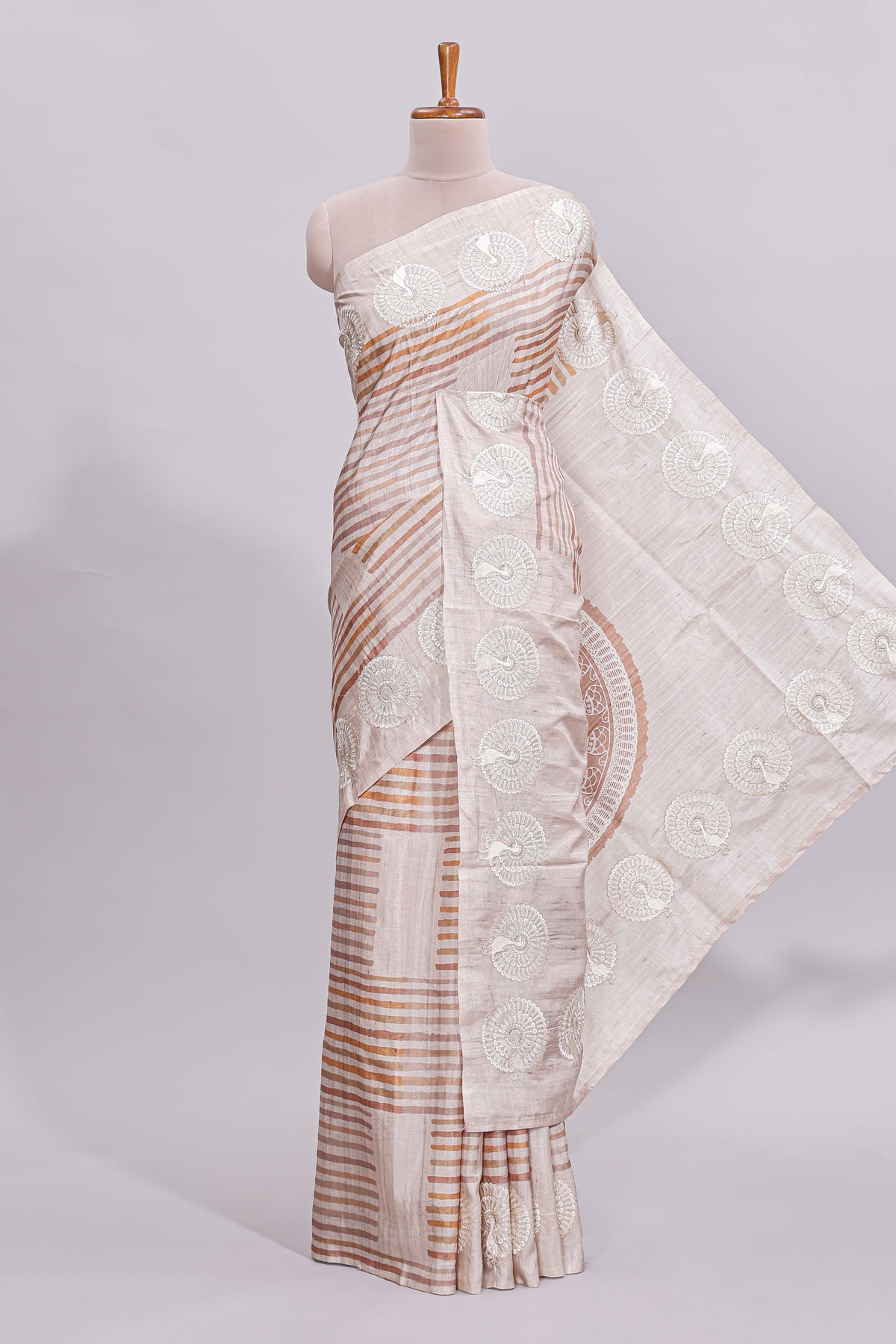 Beige striped design raw silk saree with self border and matching blouse