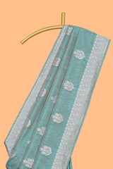 Green floral zari design raw silk saree with self zari border and matching motifs blouse