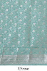 Green floral zari design raw silk saree with self zari border and matching motifs blouse