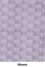 Off white striped design raw silk saree with self peacock design embroidery border and matching checked blouse