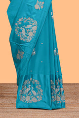 Blue floral zari motifs design raw silk saree with self zari border and matching blouse