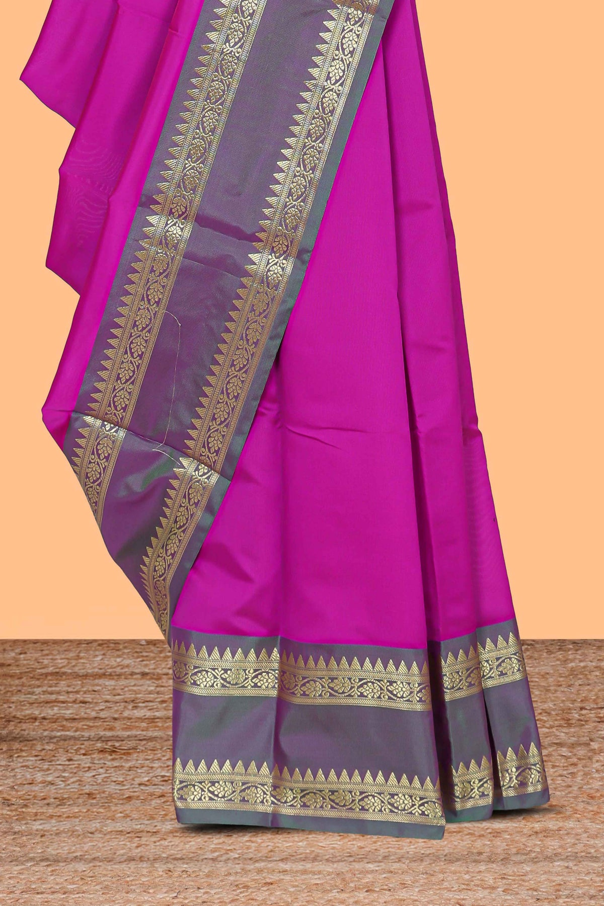 Bright pink plain raw silk saree with contrast bentex border and blouse
