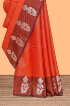 Orange checked raw silk saree with contrast border and matching blouse