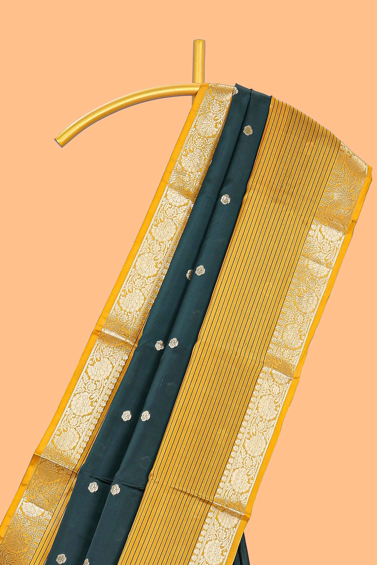 Green butta designed raw silk saree with contrast border and blouse
