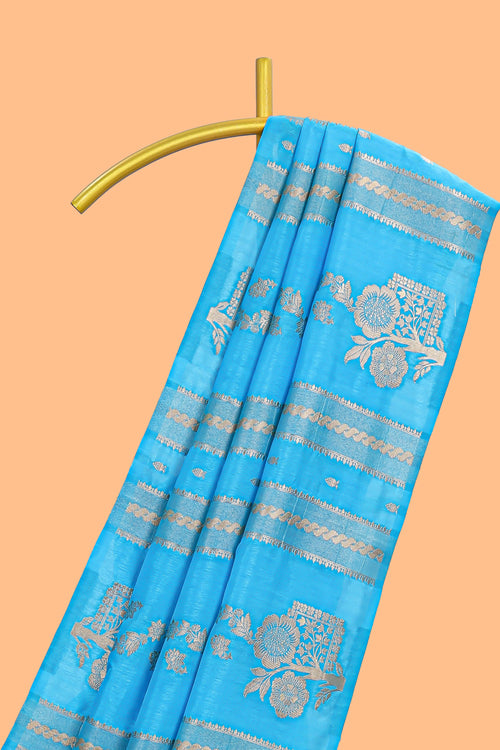 Borderless blue striped zari motifs design raw silk saree with self pallu and matching blouse