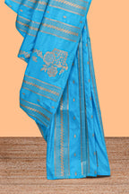 Borderless blue striped zari motifs design raw silk saree with self pallu and matching blouse