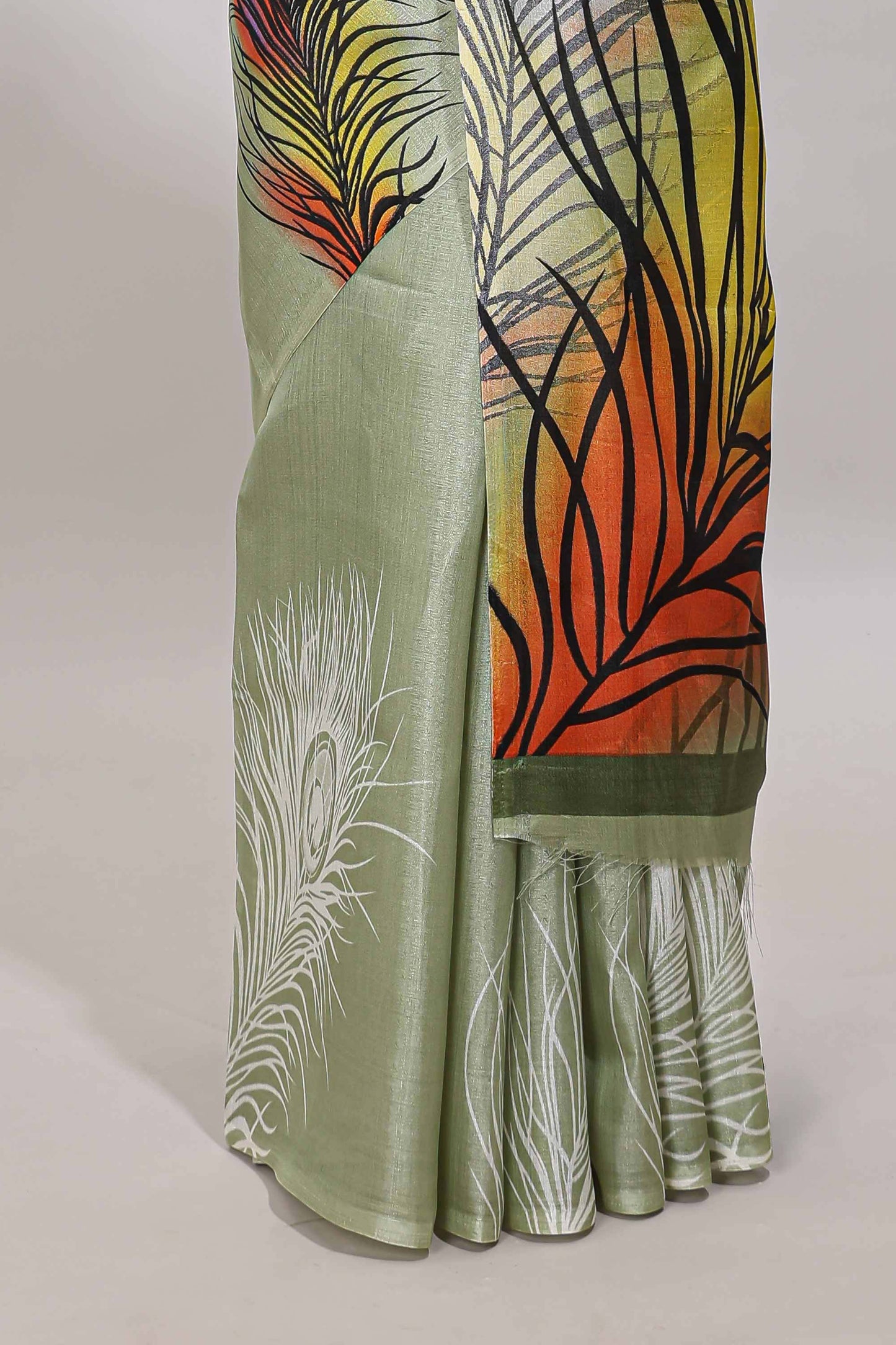 Pastel green peacock feather print south cotton saree with matching blouse