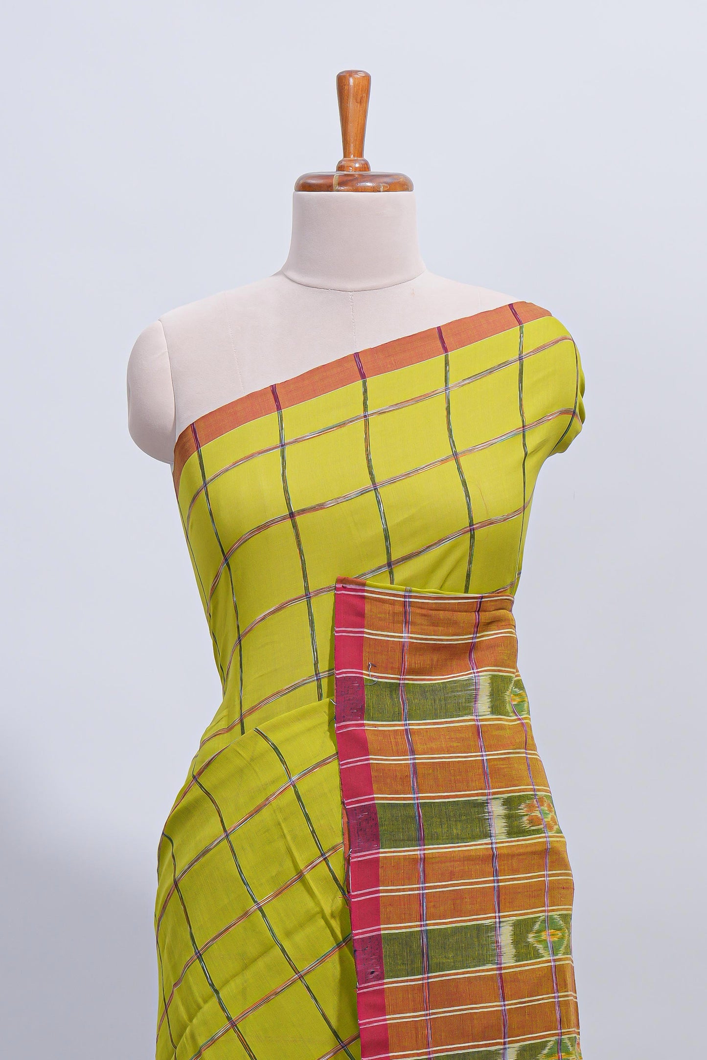 Green checked south cotton saree with contrast border and ikkat style pallu