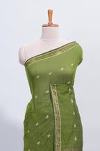 Green thread butta south cotton saree with self zari border and matching pallu